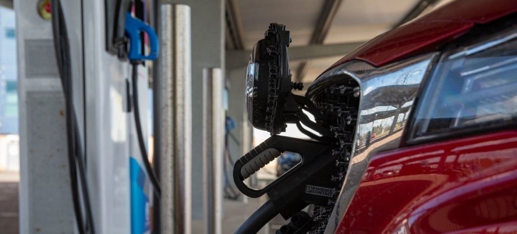 An electric vehicle is charged in Scotland in the UK